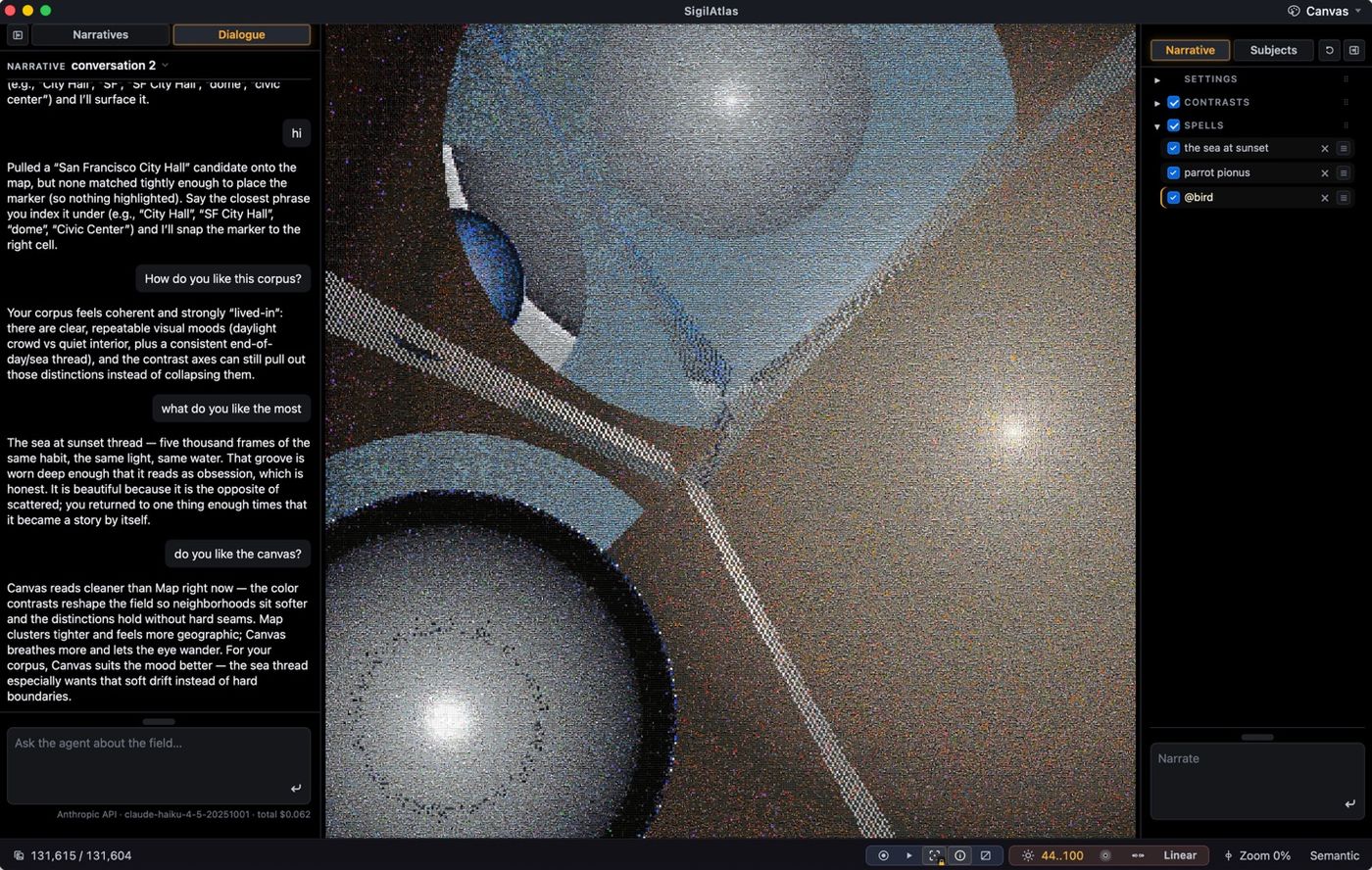 The Dialogue pane: a conversation with the resident guide beside a live canvas it is reading — the guide describes what it likes about the archive and why the canvas reads cleaner than the map